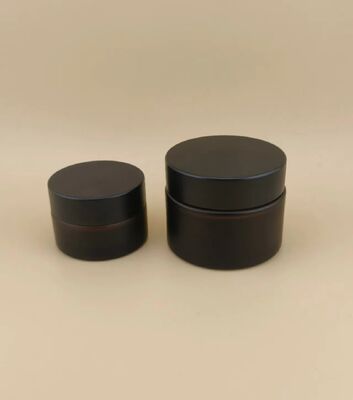Bonito diseño Vidrio negro Jarrón de crema con tapa de tornillo para loción
