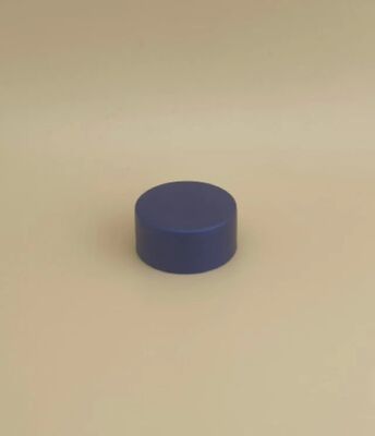 Tapa de plástico azul oscuro de diseño delicado para botellas de cuidado de la piel