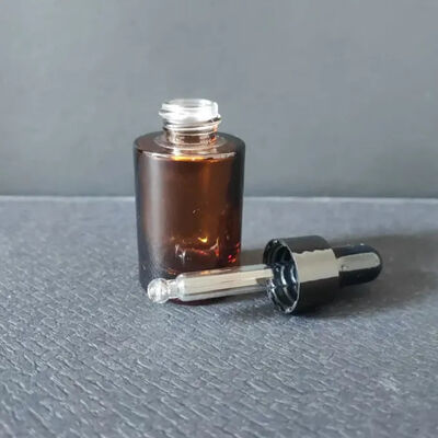 Mejor vendido Transparente 30ml 1 oz Embalaje de aceite de cabello vacío Frito personalizado de suero cosmético de goteo Botella de vidrio con pipeta