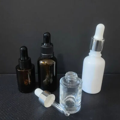 Producto de venta caliente Ojo Cara Aceite esencial Embalaje cosmético Claros 15ml 30ml 50ml Botella de vidrio cuadrada plana