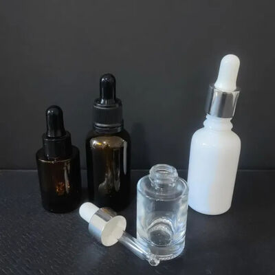 Suministrador de alta calidad Amber Clear Boston 2 oz botella de vidrio de aceite esencial con gotero 60 ml para suero