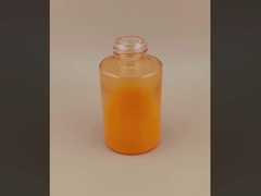 Nuevo diseño de botella de vidrio liso naranja para loción de remojo