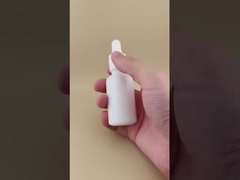 Botella cuentagotas redonda lisa blanca de diseño delicado para el cuidado de la piel