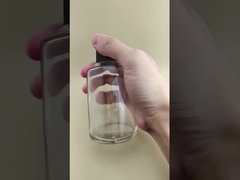 Diseño delicado, botella de vidrio redonda grande y lisa transparente con tapa especial para medicamento