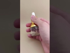 Hermosa botella redonda transparente con gotero para esencia