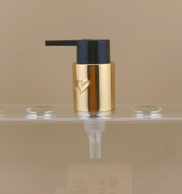 Bomba de crema negra y dorada con impresión K702-1 para botellas de cosméticos