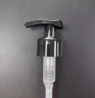 Bomba de loción nueva de plástico con bloqueo derecho izquierdo Bomba de loción para botella