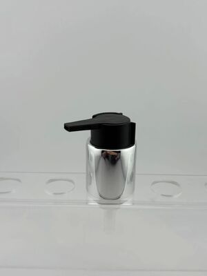 28/410 Bomba de crema de plástico negro mate con clip para envases de cosméticos