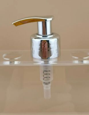 Nuevo diseño de la bomba de loción de bloqueo izquierda-derecha de plata para el champú