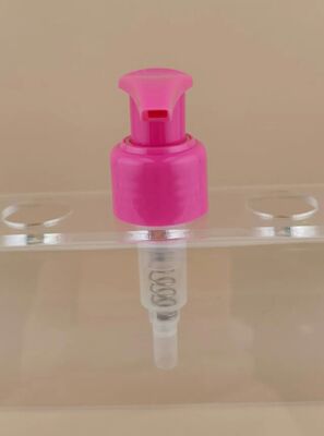 Nuevo diseño de la bomba de loción de bloqueo izquierda-derecha rosa para cosméticos