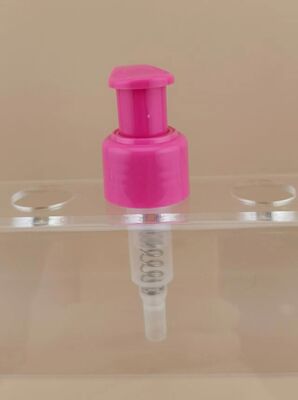 Nuevo diseño de la bomba de loción de bloqueo izquierda-derecha rosa para cosméticos