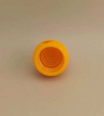 Capa esférica de plástico amarillo liso y mate para botellas de cosméticos