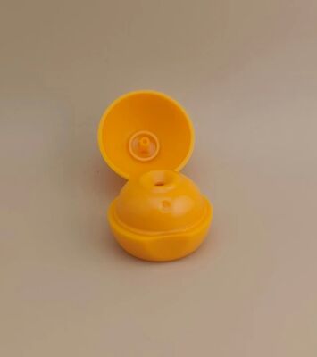 Capa esférica de plástico amarillo liso y mate para botellas de cosméticos