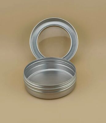 Gran caja de aluminio plateado con tapa de tornillo transparente para cosméticos