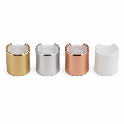 Botellas de aluminio-plástico dorado con tapa lisa y botón transparente para el cuidado de la piel