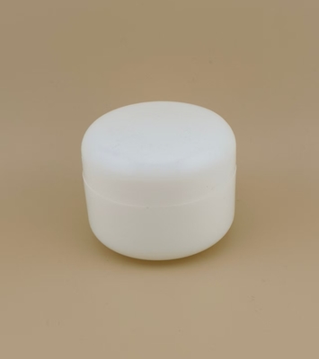 Jarrón de crema de plástico para el cuidado de la piel femenino con tapa de tornillo