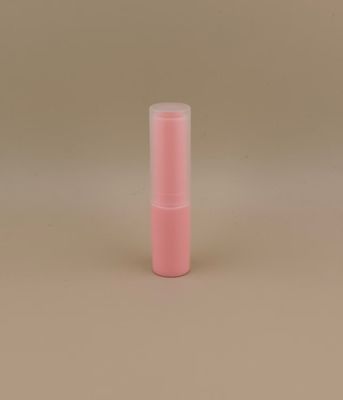 Embalaje de bálsamo labial rosa pequeño con tapa mate lisa y clara para lápiz labial