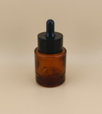 Botella cuentagotas de vidrio pequeña marrón de diseño delicado para esencia facial
