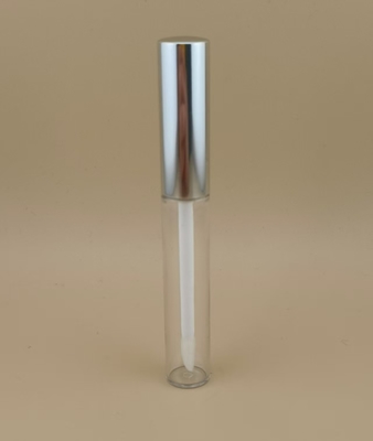 Diseño delicado de envase transparente para bálsamo labial con tapa plateada para labiales