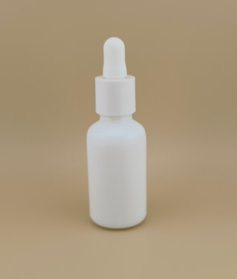 Botella cuentagotas redonda lisa blanca de diseño delicado para el cuidado de la piel