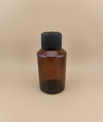 Diseño delicado Botella de vidrio de color marrón liso y redondo con tapa especial para medicamento