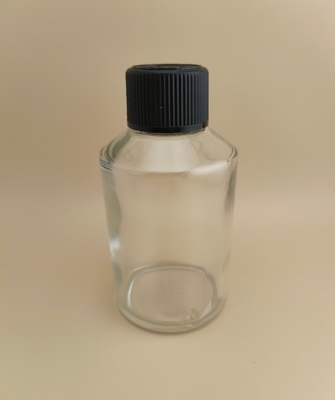 Diseño delicado, botella redonda grande de vidrio transparente y liso con tapa especial para medicamento