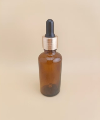 Diseño delicado Botella de goteador redonda suave para el cuidado de la piel